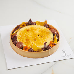 Milk chocolate, orange and vanilla creme brûlée tart